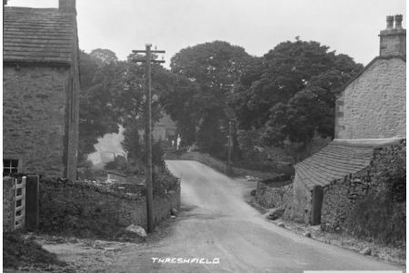 T-11-296 Road in village down to bridge.jpg