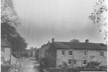 T-10-446 Road into Threshfield with Bridge House.jpg